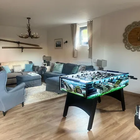 In A Luxury Chalet, Living Room, Kitchen And Games Guest house *