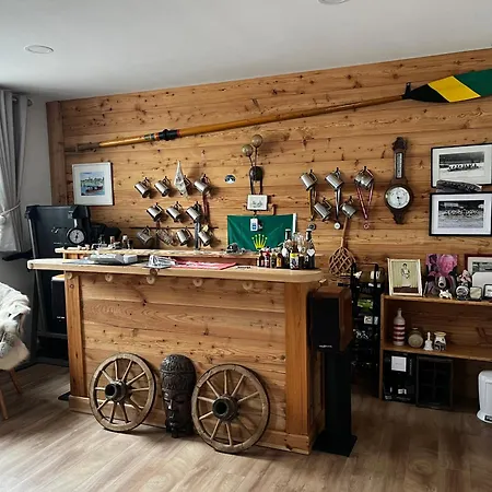In A Luxury Chalet, Living Room, Kitchen And Games Guest house Tamsweg